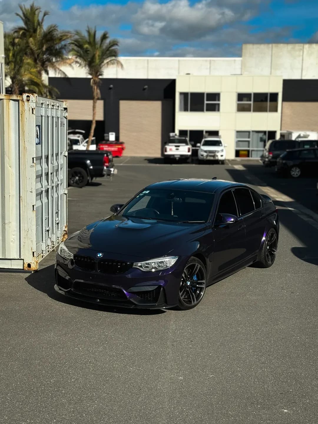 Midnight purple colour change wrap on a BMW M3, outside the Wrap Culture workshop in Mount Maunganui